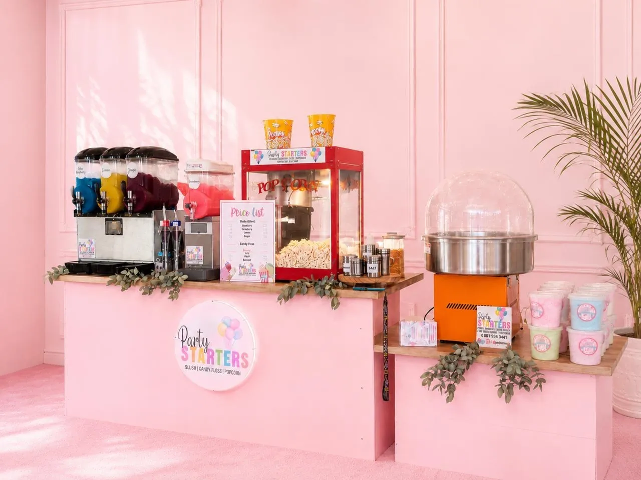 Pink treat station: Slush, popcorn and candy floss on a fully branded setup