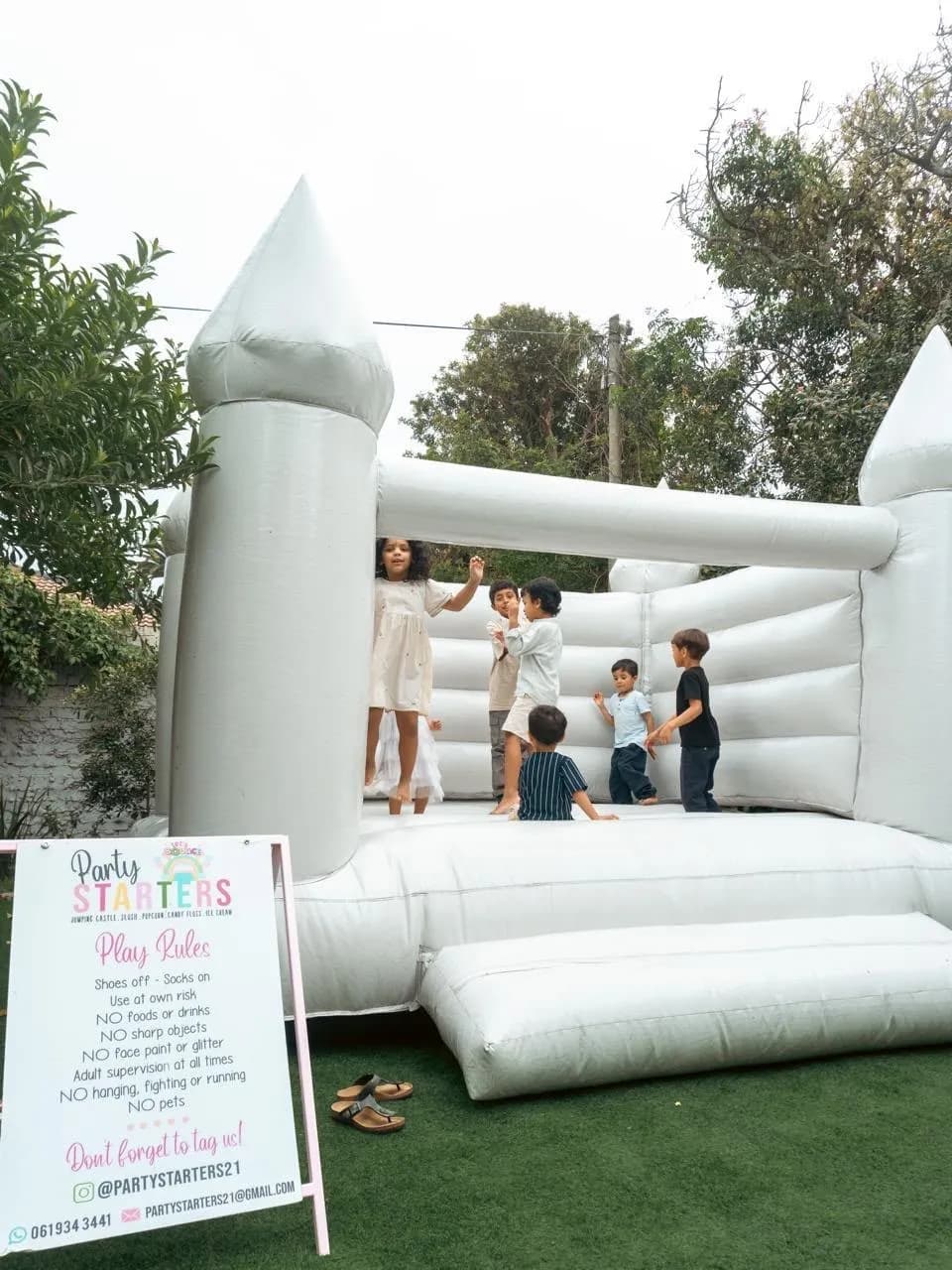 White castle party: Our white jumping castle, set up and ready