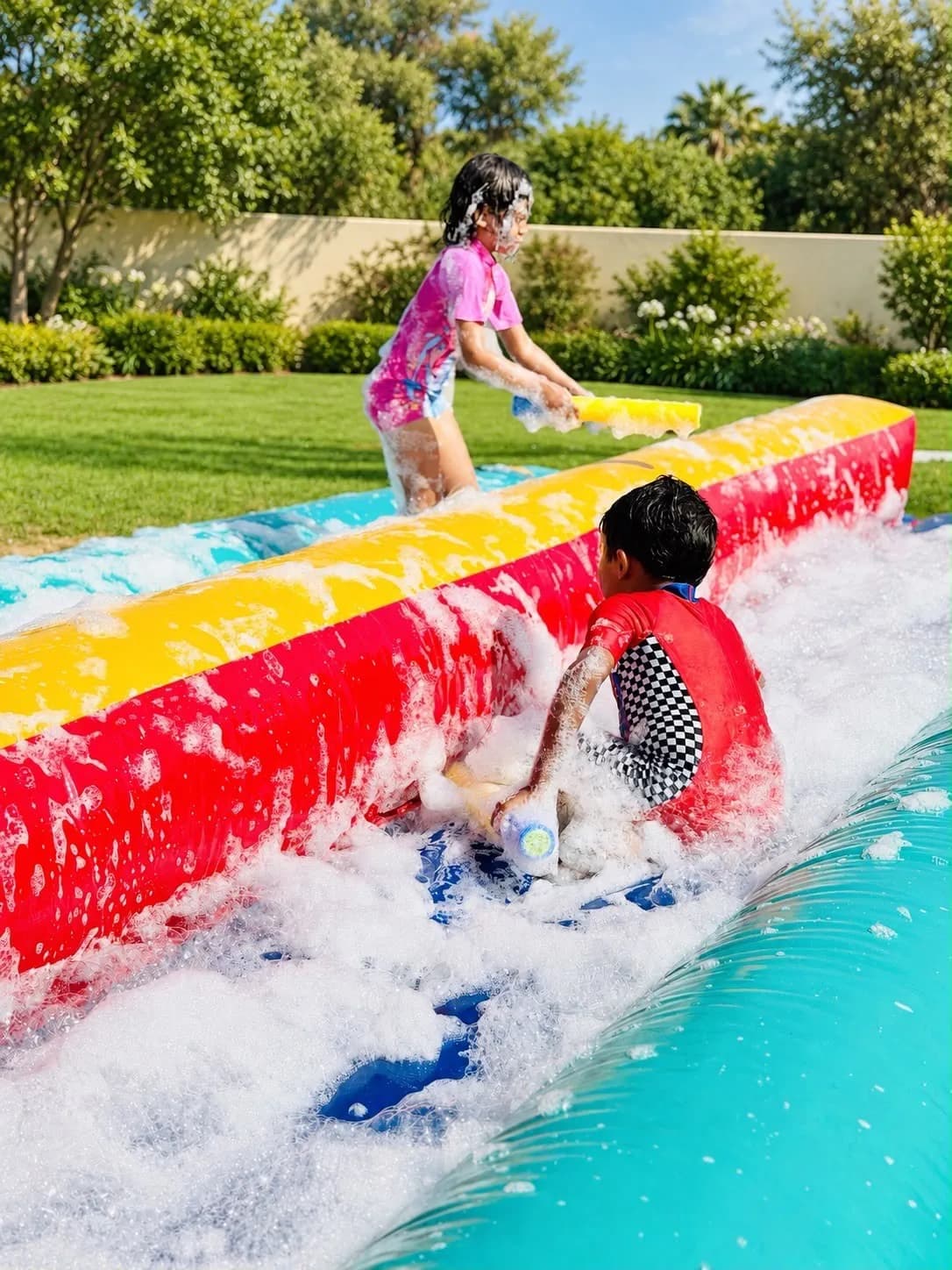 Foam waterslide fun: The summer favourite