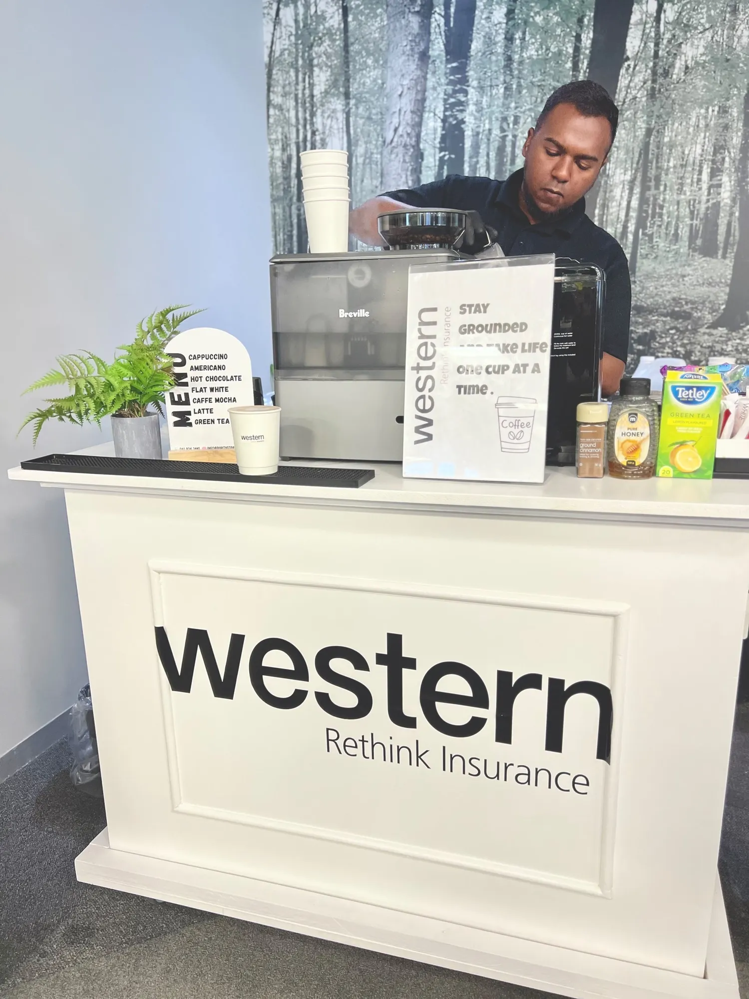 Party Starters branded display cabinet with a barista coffee station