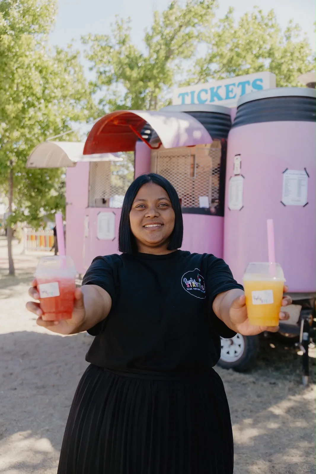The Party Starters team serving slushes